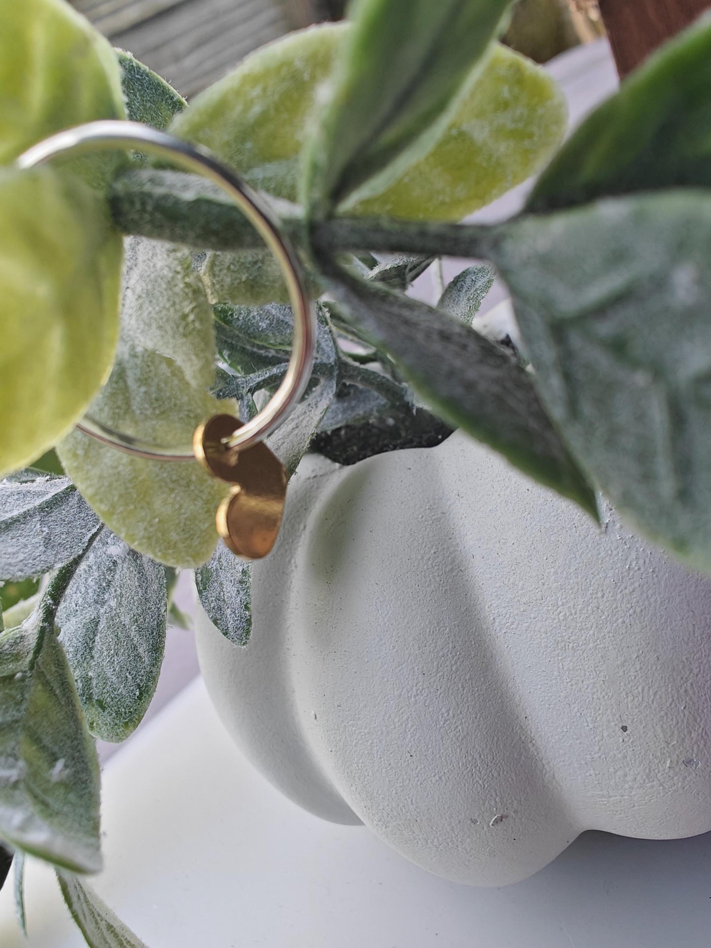 Silver hoop earrings with heart