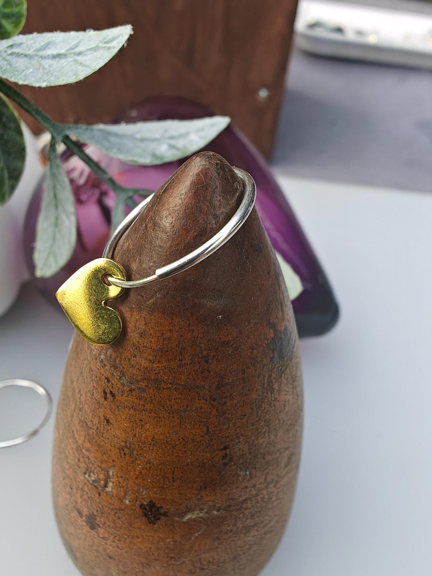 Silver hoop earrings with heart