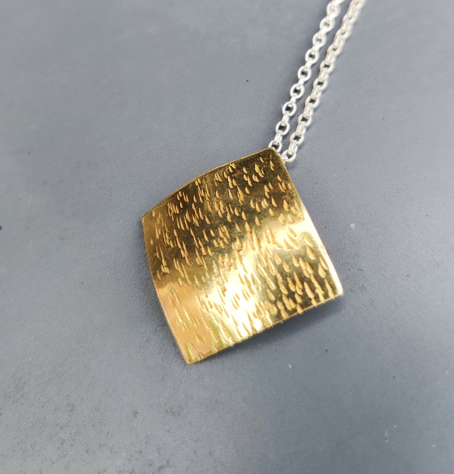 Textured brass pendant, jewellery