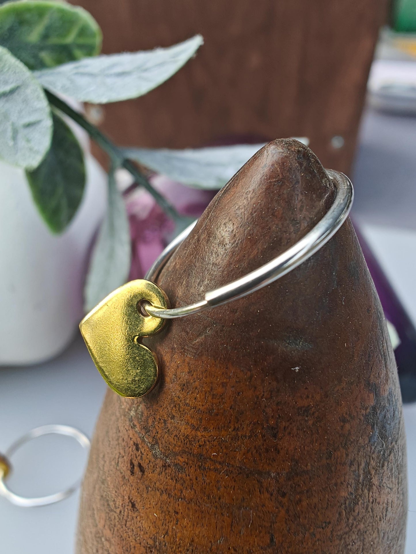 Silver hoop earrings with heart