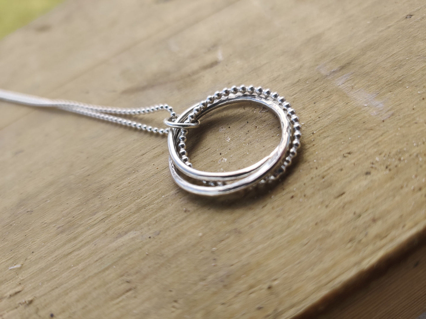 Twisted hoops pendant, silver
