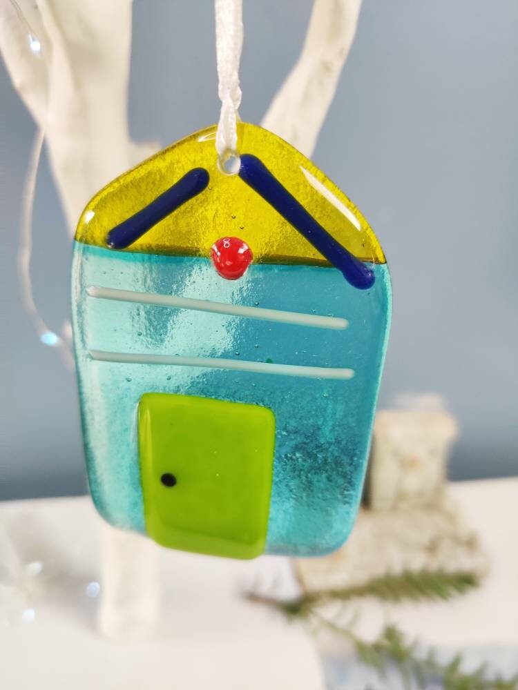 glass beach hut, green glass