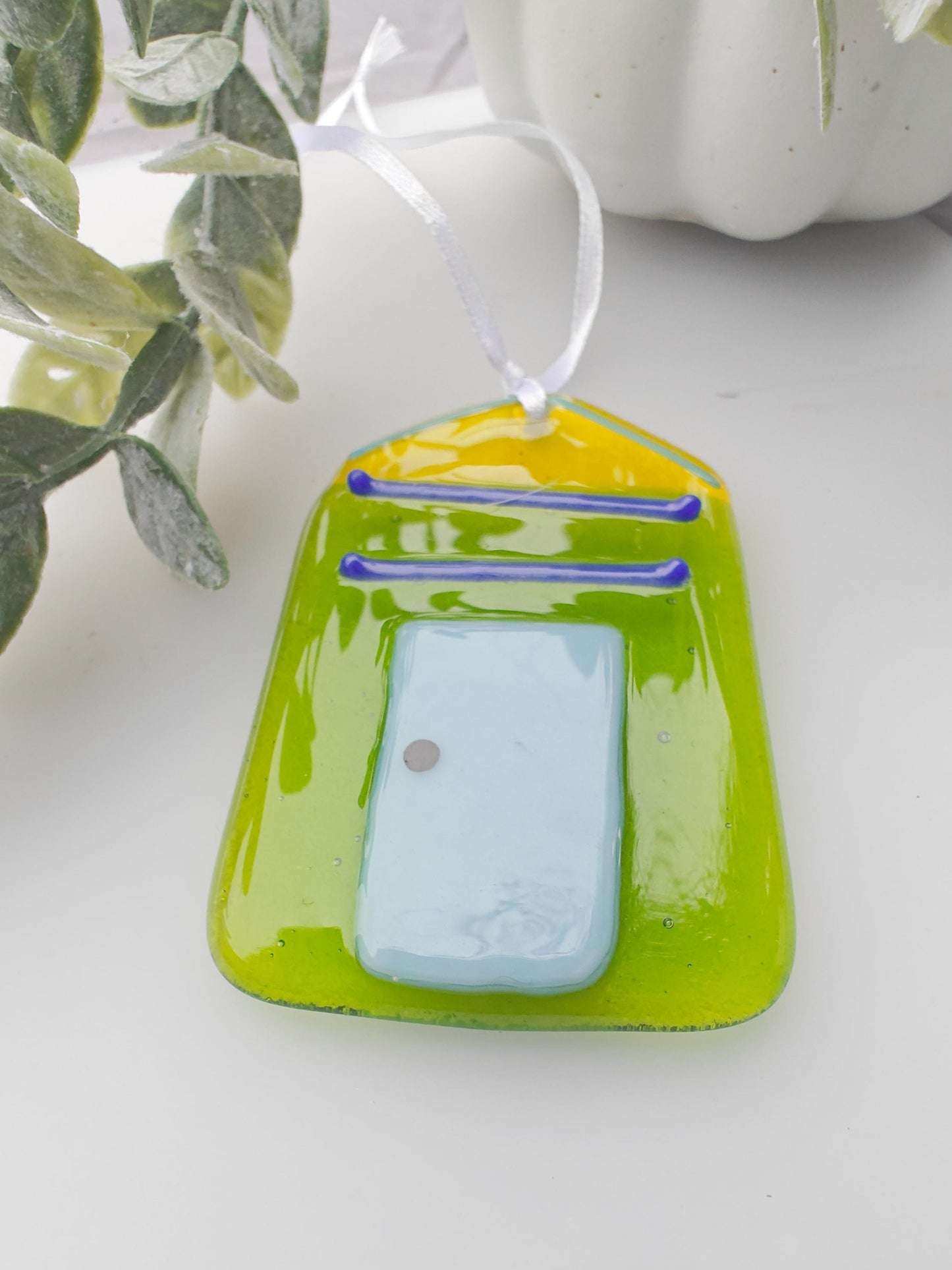 Green and yellow glass, beach hut
