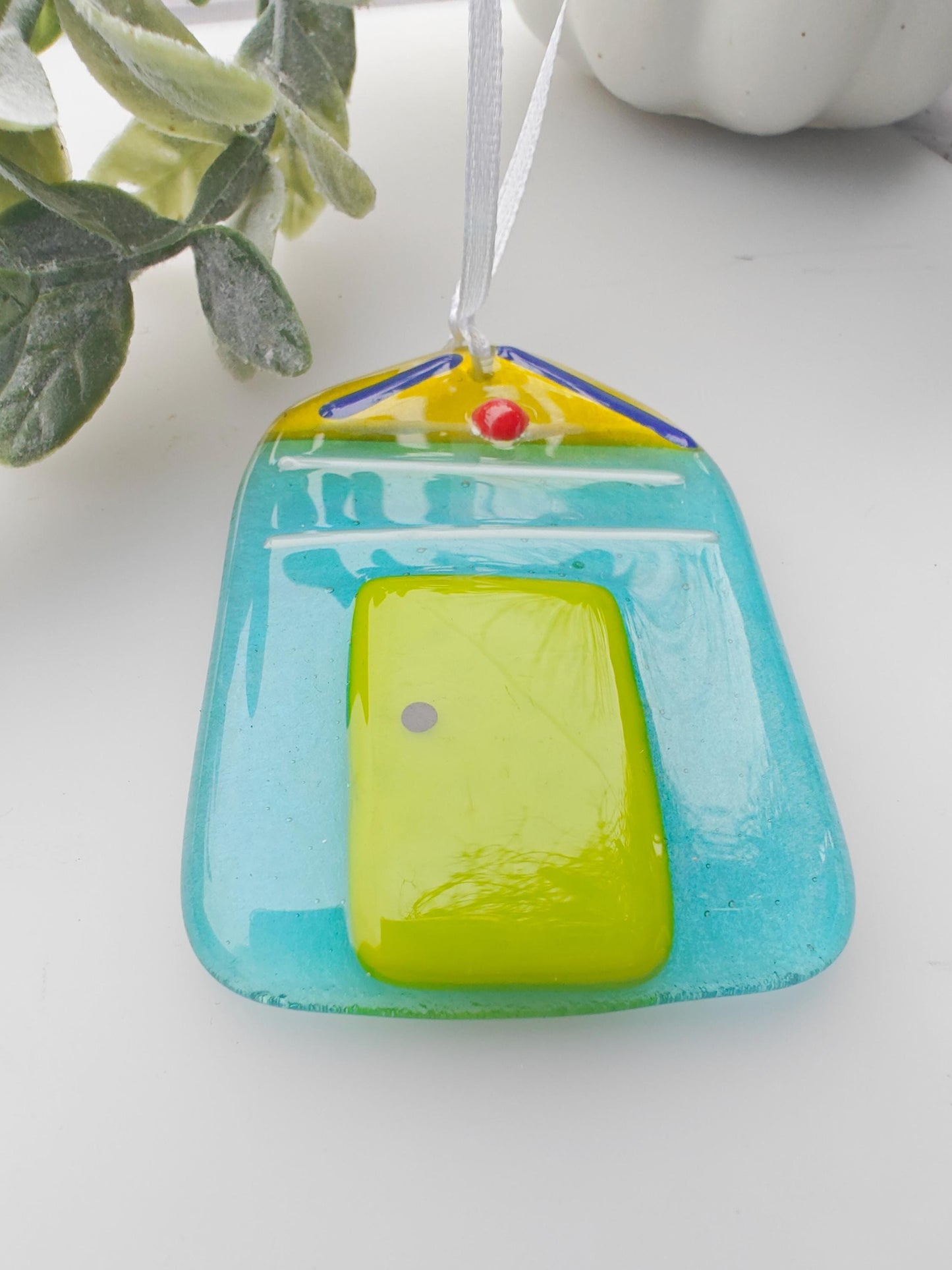 glass beach hut, green glass