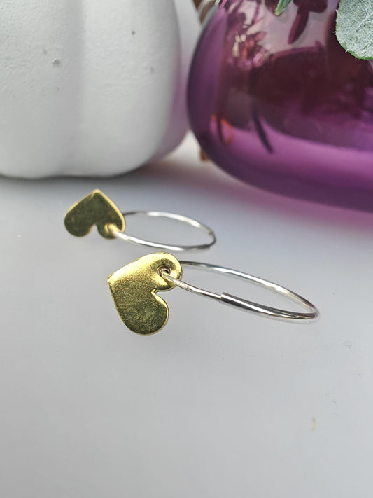 Silver hoop earrings with heart
