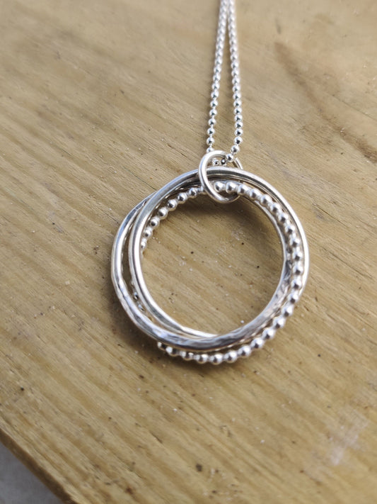Twisted hoops pendant, silver