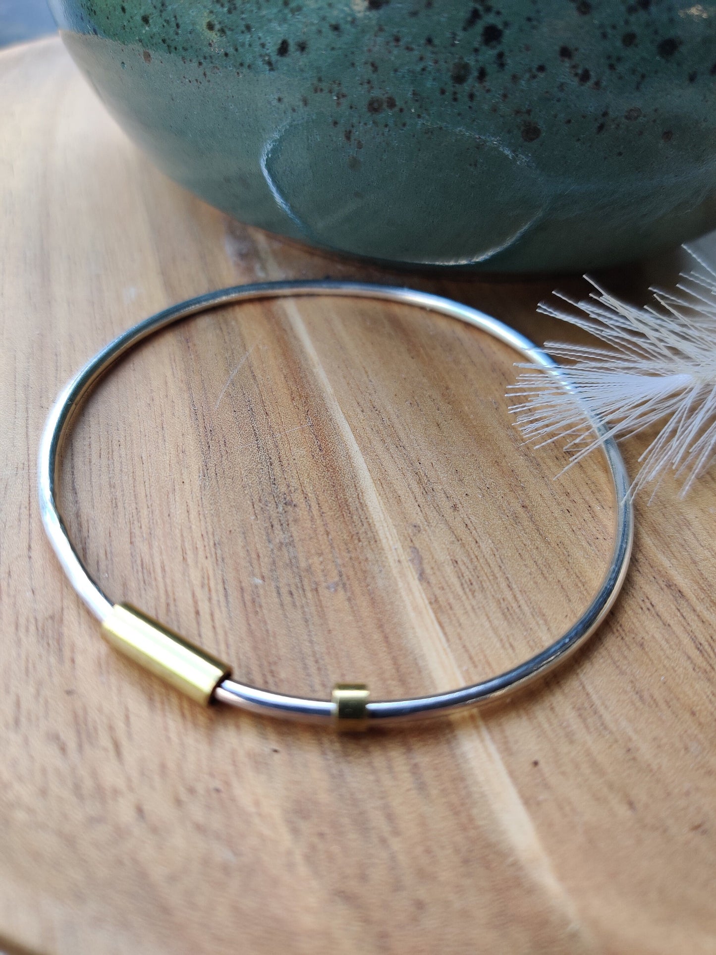Silver and brass spinner bangle