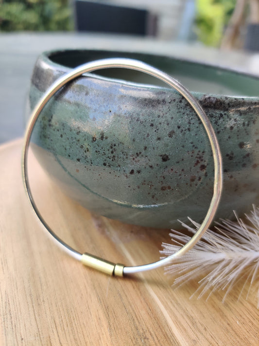Silver and brass spinner bangle