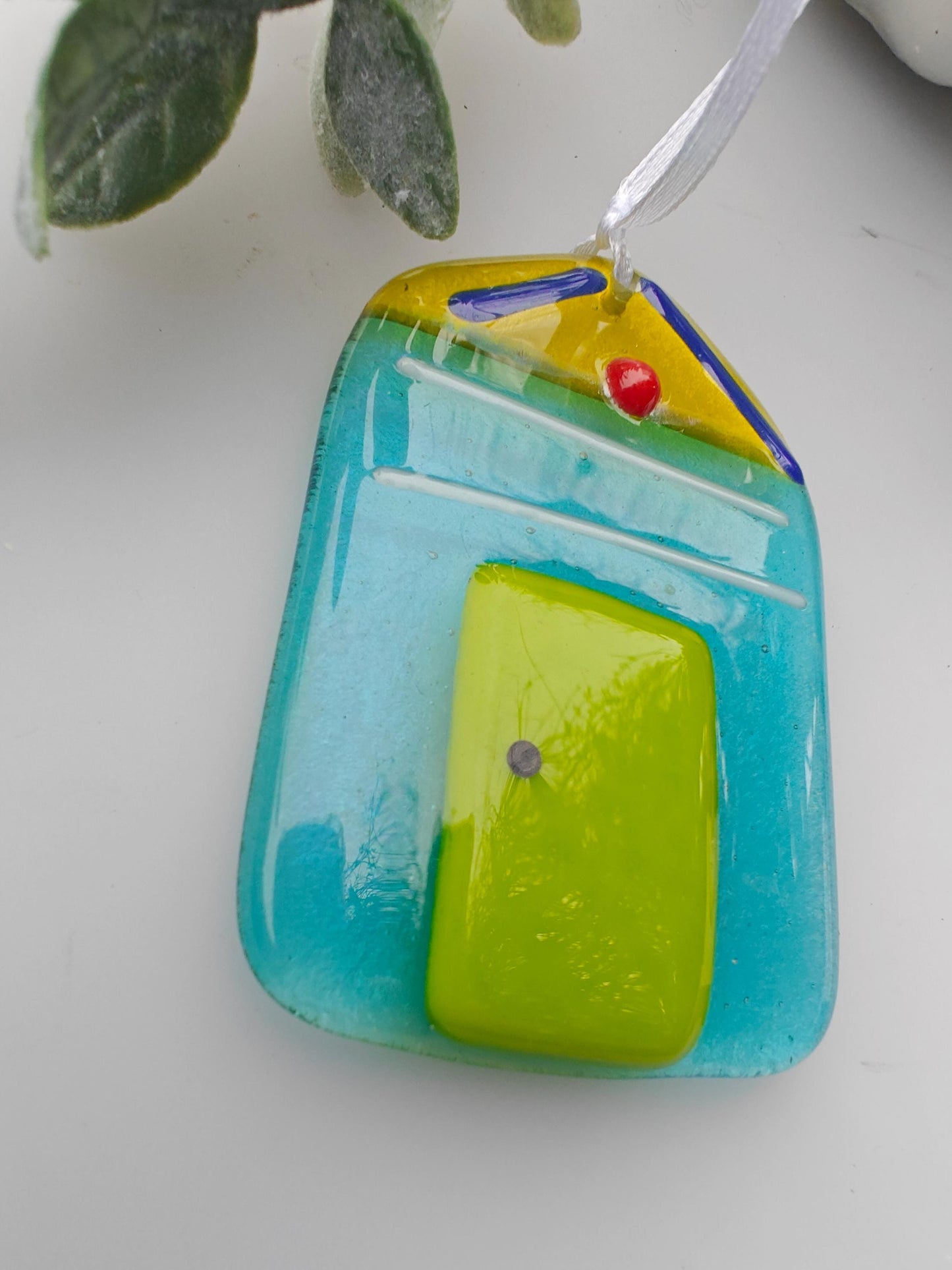 glass beach hut, green glass