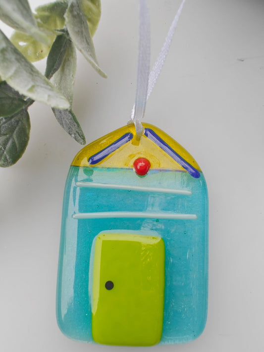 glass beach hut, green glass