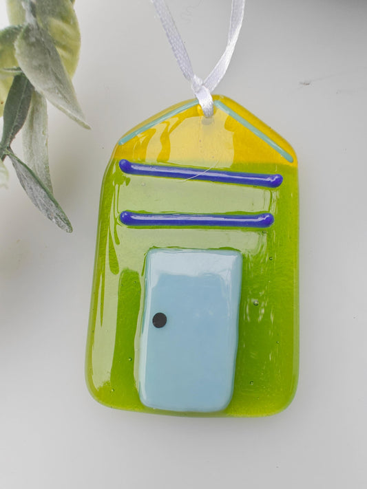Green and yellow glass, beach hut